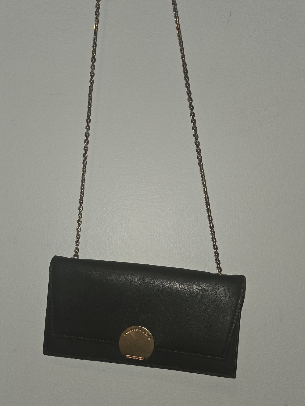 Charles & Keith Black Clutch with Gold Disc Lock